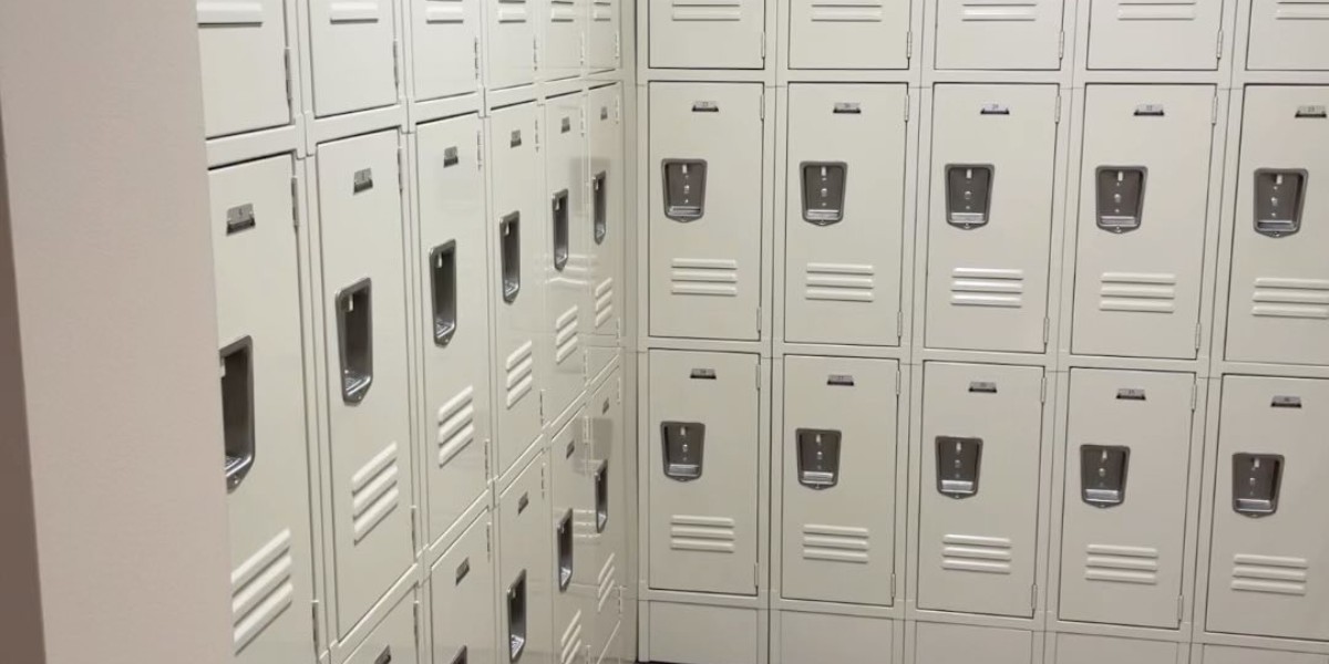 A long bank of tan metal lockers in two tiers along a wall